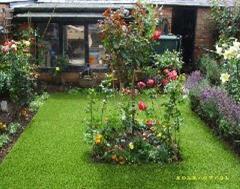 A beautiful rose garden with artificial grass